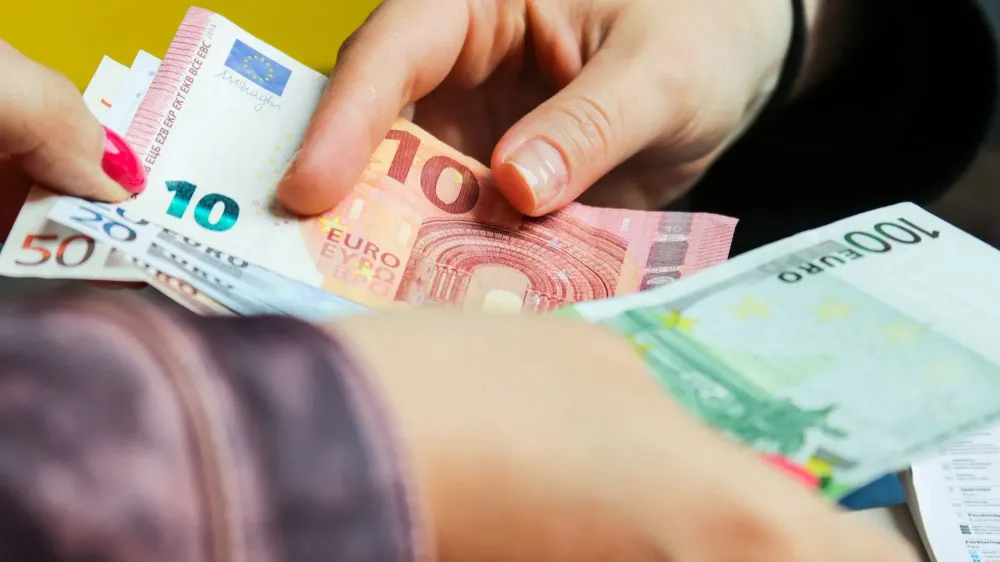 Making change for Euros, a common counterfeit money.